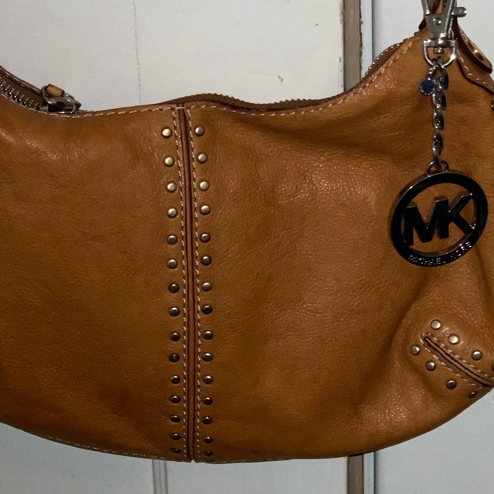 Cute genuine leather Michael Kors bag.